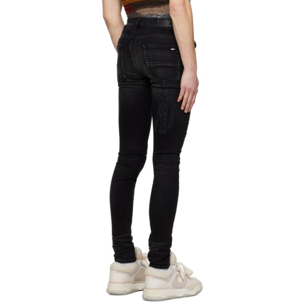  아미리 AMIRI Black Distressed Jeans 231886M186041