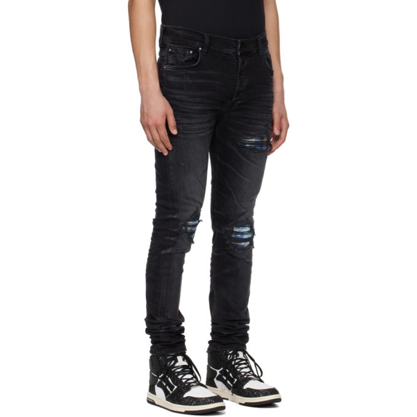  아미리 AMIRI Black Distressed Jeans 241886M186021