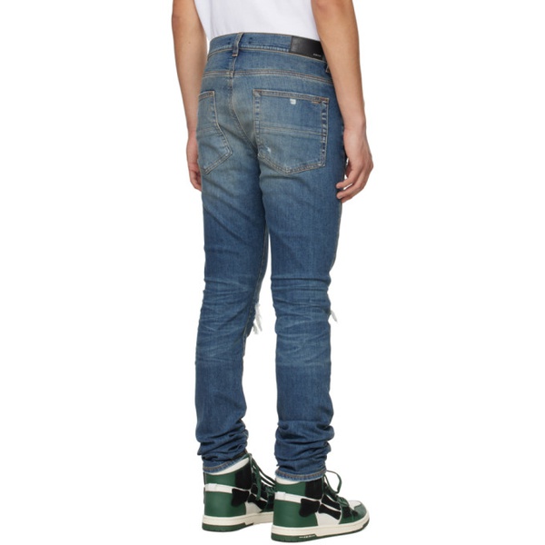  아미리 AMIRI Blue Distressed Jeans 241886M186022