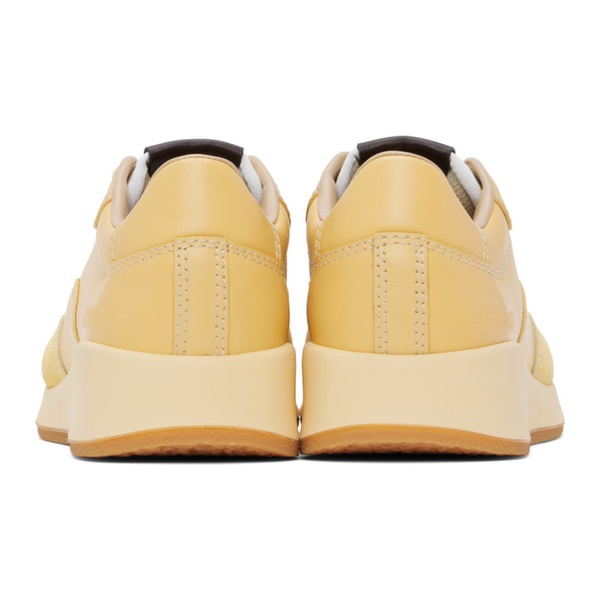  자크뮈스 JACQUEMUS Yellow Les Sculptures La Daddy Sneakers 241553F128000