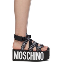 모스키노 Moschino Black Logo Tape Wedge Platform Flat Sandals 241720F124007